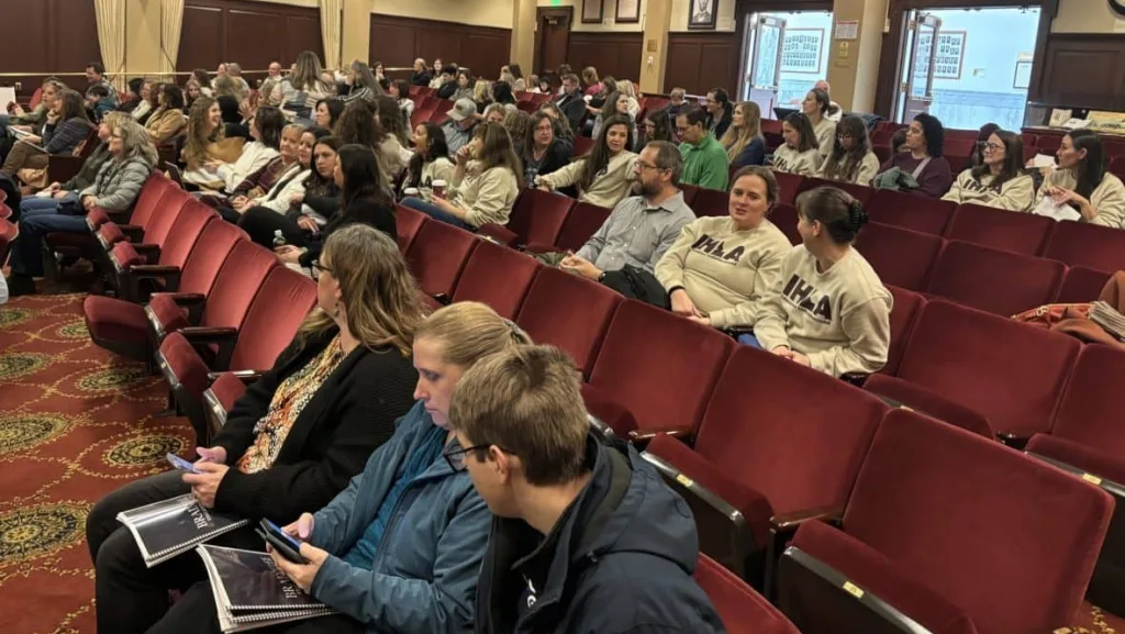 A large crowd, including Idaho Home Learning Academy parents and supporters, gather at the Statehouse for Tuesday’s hearing. (Kevin Richert/Idaho Ed News)
