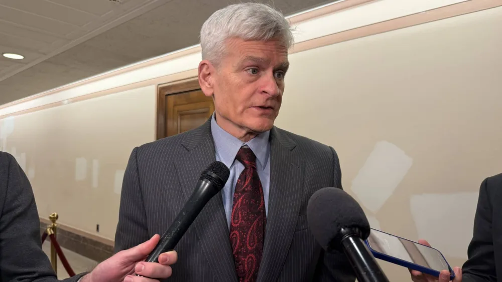 Louisiana Republican U.S. Sen. Bill Cassidy talks with reporters in the Dirksen Senate office building on Wednesday, Dec. 3, 2025. (Photo by Jennifer Shutt/States Newsroom)