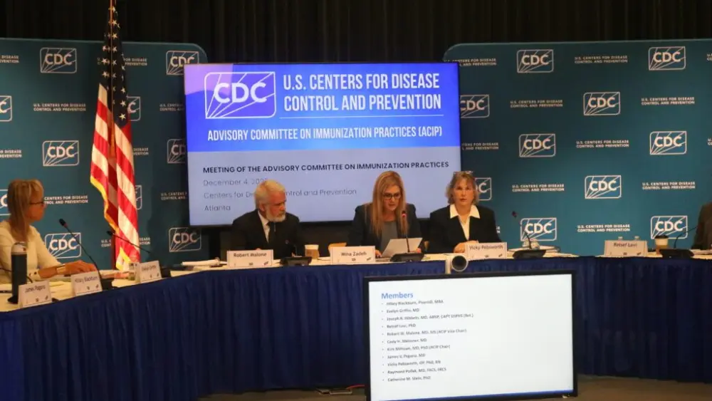 Members of a key CDC advisory committee, known as the Advisory Committee on Immunization Practices, met in Atlanta on Dec. 4. Maya Homan/Georgia Recorder