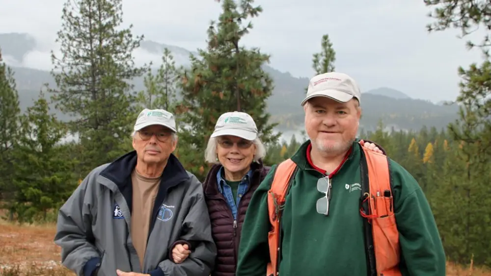 Lynn and Becky Miner with WSU Extension Forester Andy Perleberg (right).