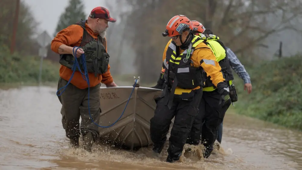 Crews conduct joint water rescue operations with the Pierce County Sheriff’s Office as flooding continues across the region.