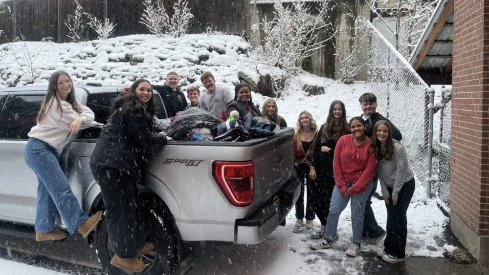 Moscow High School Students pose with a truckload of donated items after their clothing drive last month. (Courtesy Moscow School District)