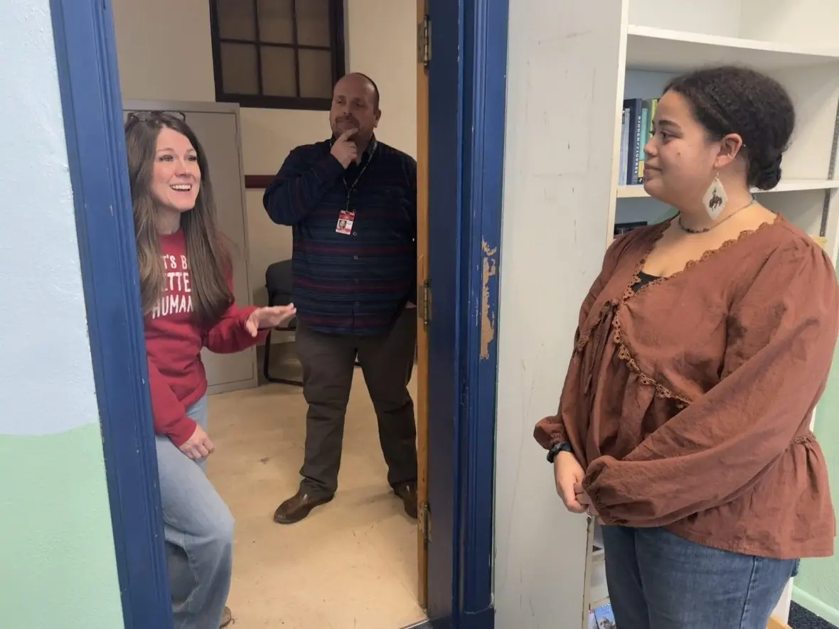 Melissa Godfrey, Brian Smith, and Vanessa Thomas (left to right) talk about the community schools grant.