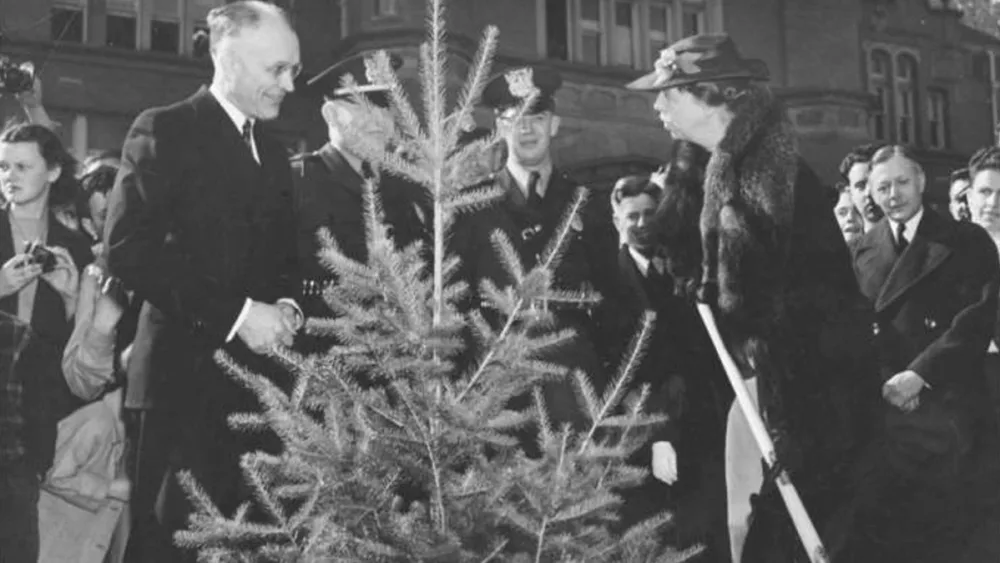 Eleanor Roosevelt, right, plants a Douglas fir at University of Idaho in 1938.