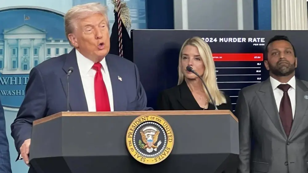 President Donald Trump, joined by U.S. Attorney General Pam Bondi and FBI Director Kash Patel, speaks at a news conference at the White House, Aug. 11, 2025. Photo: Sarah Roderick-Fitch / The Center Square