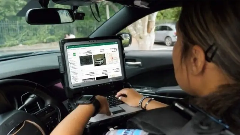 A police officer uses the Flock Safety license plate reader system. Many left-leaning states and cities are trying to protect their residents’ personal information amid the Trump administration’s immigration crackdown, but a growing number of conservative lawmakers also want to curb the use of surveillance technologies. (Photo courtesy of Flock Safety)
