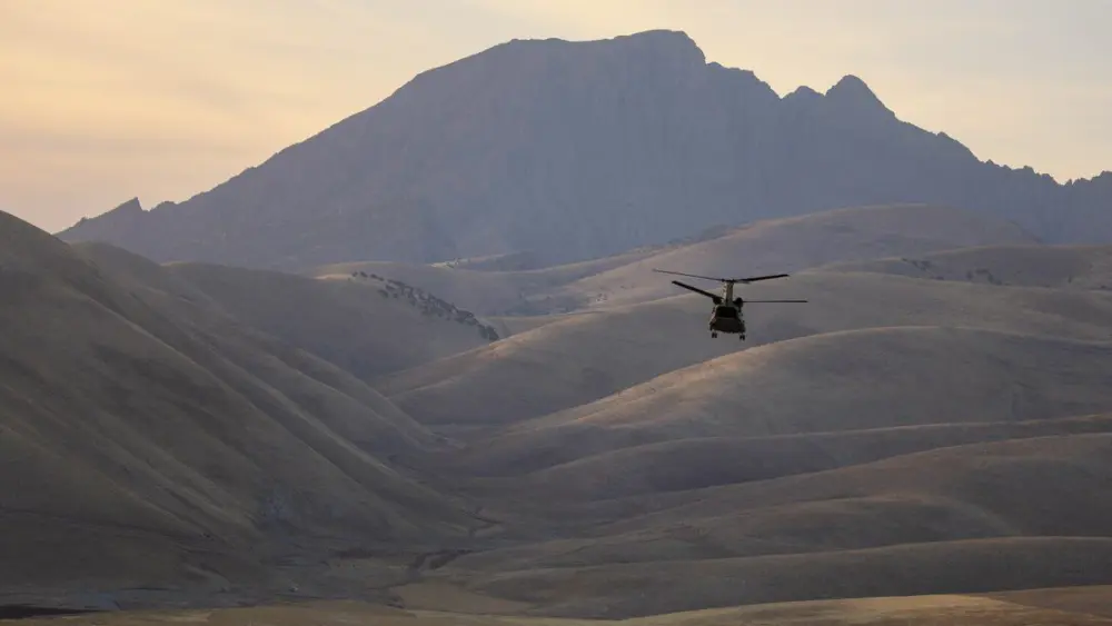 A U.S. Army CH-47 Chinook helicopter flies near Irbil Air Base in Iraq during a mission on May 26, 2025. (U.S. Army photo by Sgt. Brianna Badder)