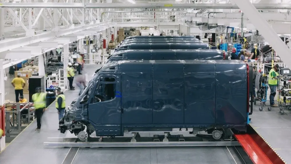 Employees work at a Rivian electric vehicle factory in Normal, Ill., in 2021. (Courtesy of Rivian)