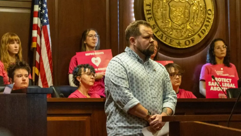 Nikson Mathews, chair of the Idaho Democratic Queer Caucus, joined activists and local elected officials to push back against anti-LGBTQ+ bills in the Idaho Legislature in a news conference on Feb. 16, 2026. (Photo by Kyle Pfannenstiel/Idaho Capital Sun)