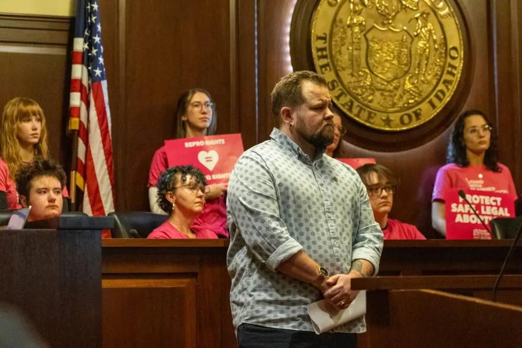 Nikson Mathews, chair of the Idaho Democratic Queer Caucus, joined activists and local elected officials to push back against anti-LGBTQ+ bills in the Idaho Legislature in a news conference on Feb. 16, 2026. (Photo by Kyle Pfannenstiel/Idaho Capital Sun)