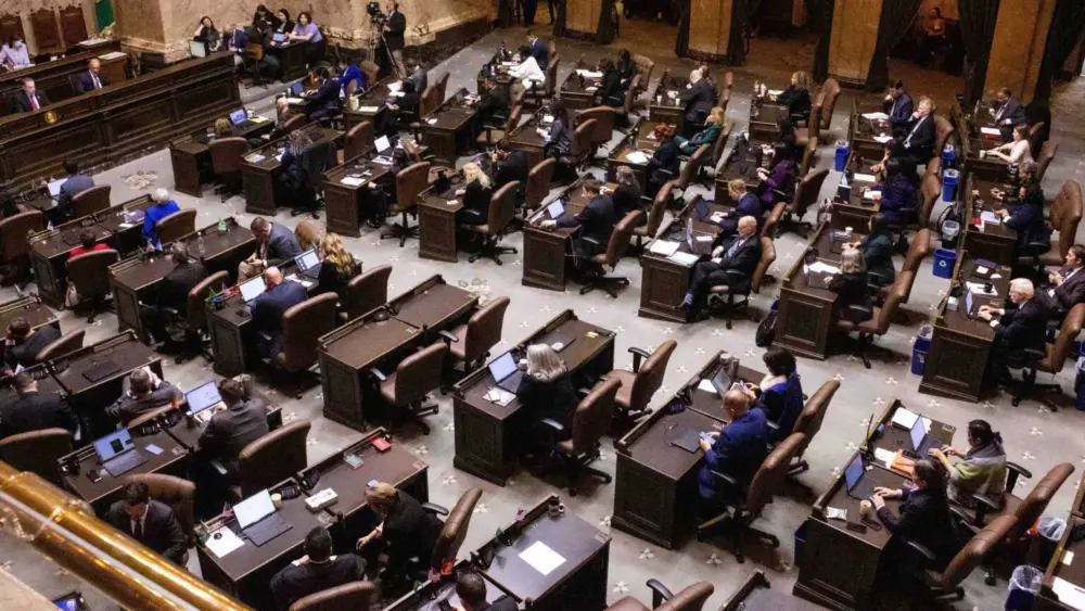 Washington state lawmakers in the House chamber on the first day of the 2026 legislative session. (Photo by Jacquelyn Jimenez Romero/Washington State Standard)