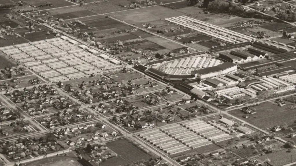 Aerial view of Camp Harmony at the Puyallup fairgrounds, April 14, 1942. Japanese Americans were temporarily detained at the site following Executive Order 9066. Photo: U.S. National Archives and Records Administration (Public Domain).