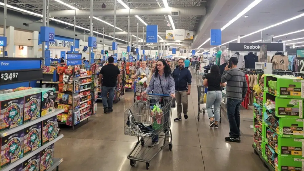 People shop for groceries at a Walmart store in Ohio. State officials across the country are looking to crack down on fraud and mistakes in the Supplemental Nutrition Assistance Program (SNAP), formerly known as food stamps. (Photo by Marty Schladen/Ohio Capital Journal)