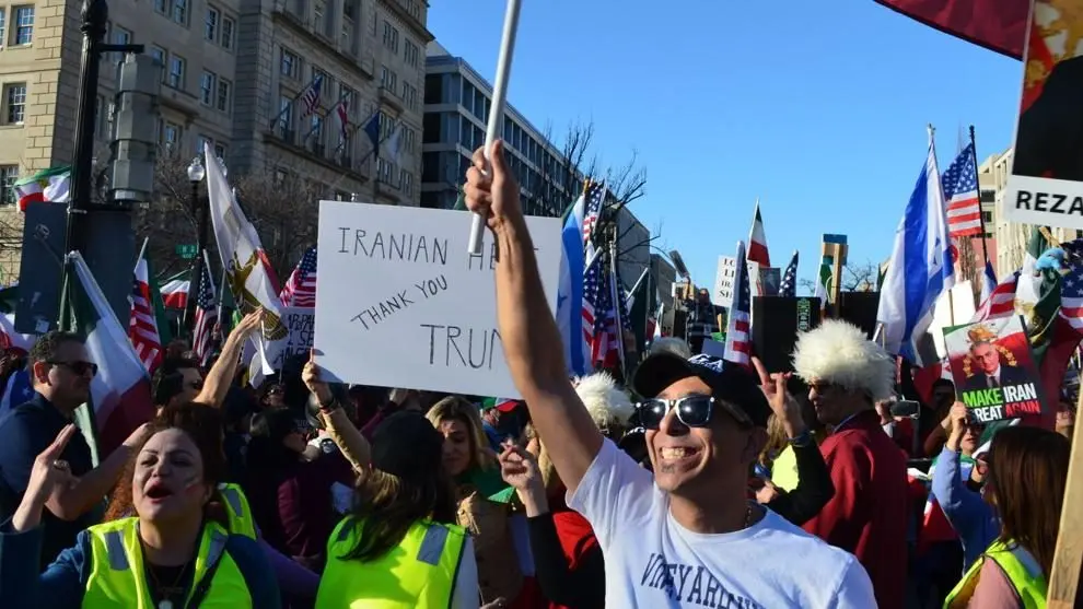Iranians celebrate outside the White House on Feb. 28, 2026 after the U.S. conducted military operations in Iran, killing the country's supreme leader. Photo: Andrew Rice / The Center Square