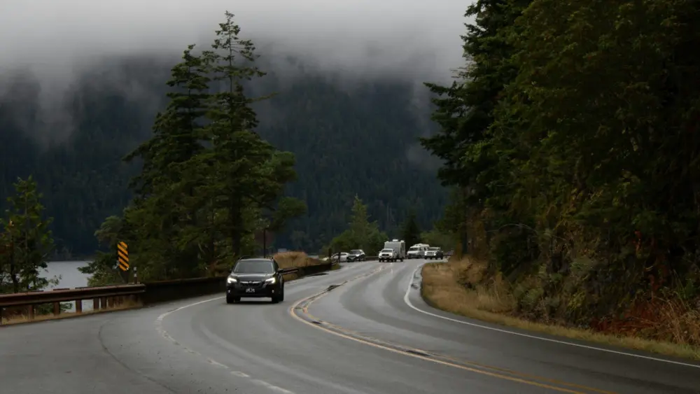 A foggy day on the U.S. 101 that runs along the perimeter of Lake Crescent in Olympic National Park. Photo by Zoshua Colah on Unsplash