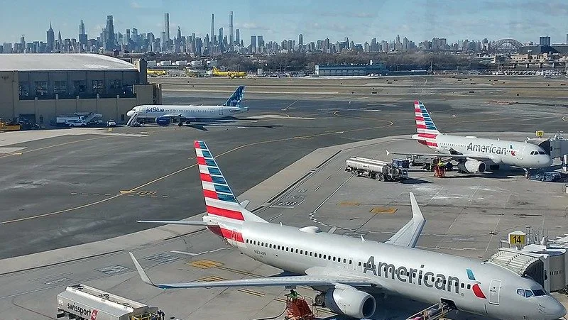 Commercial airplanes sit on the tarmac at LaGuardia Airport in New York. Photo: Paul Lowry / Flickr / CC BY 2.0 / Cropped from Original
