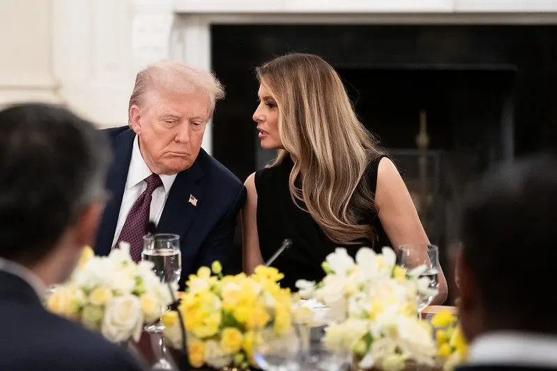 First lady Melania Trump speaks with President Donald Trump during a dinner for business leaders at the White House, Sept. 4, 2025. Photo: Andrea Hanks / Official White House Photo via Flickr / United States Government Work