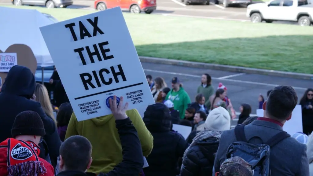 Unions and other supporters of the income tax on millionaire earners rally at the Capitol on Feb. 10, 2026. (Photo by Bill Lucia/Washington State Standard)