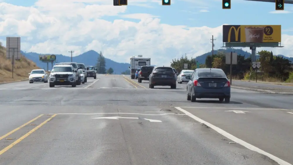 Rutted pavement on the left turn lane from westbound Oregon 42 onto Grant Smith Road in 2022. (Photo by Oregon Department of Transportation)