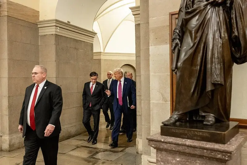 President Donald Trump and House Speaker Mike Johnson walk through the U.S. Capitol, May 20, 2025. Photo: Molly Riley / Official White House Photo via Flickr / United States Government Work