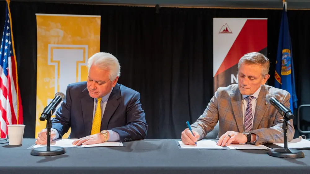 University of Idaho President C. Scott Green, left, and North Idaho College President Nick Swayne sign a memorandum of understanding establishing a Direct Entry Master of Science in Nursing program, set to launch in Fall 2027 in Coeur d’Alene. - University of Idaho