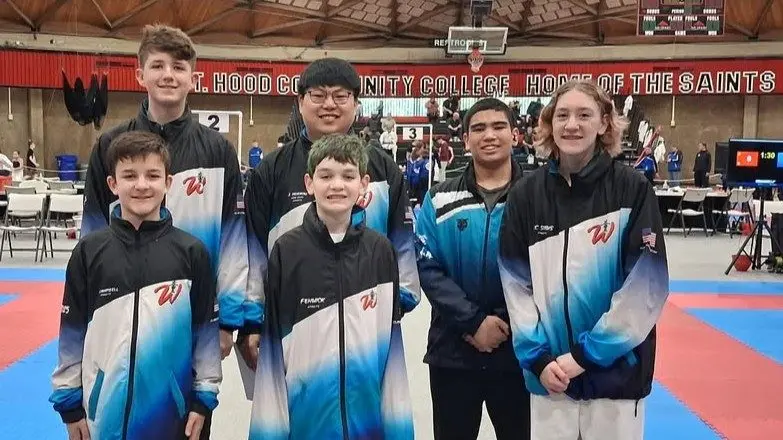Team photo, back row (left to right): Milo Jones, Coach Jon Morrow, Luke Heavrin. Front row (left to right): Maverick Campbell, Zeus Fenwick, CC Subis.