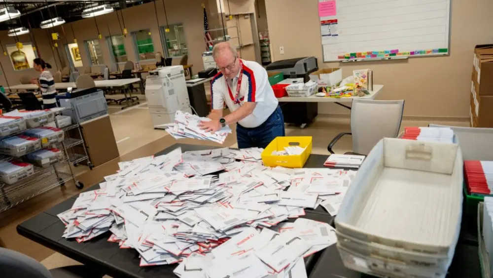 Election workers process ballots at the Davis County Administrative Building in Farmington, Utah, on Election Day, Tuesday, Nov. 5, 2024. (Photo by Spenser Heaps for Utah News Dispatch)