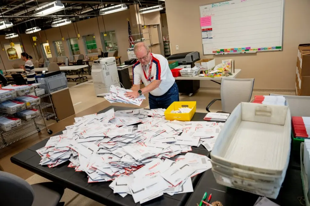 Election workers process ballots at the Davis County Administrative Building in Farmington, Utah, on Election Day, Tuesday, Nov. 5, 2024. (Photo by Spenser Heaps for Utah News Dispatch)