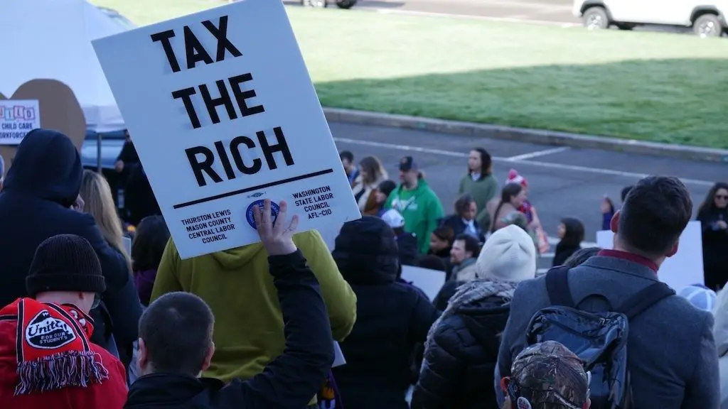 Labor unions and other supporters of an income tax on millionaire earners rallied at the Washington state Capitol in Olympia in February. A growing number of liberal states are considering raising taxes on their wealthiest residents. (Photo by Bill Lucia/Washington State Standard)