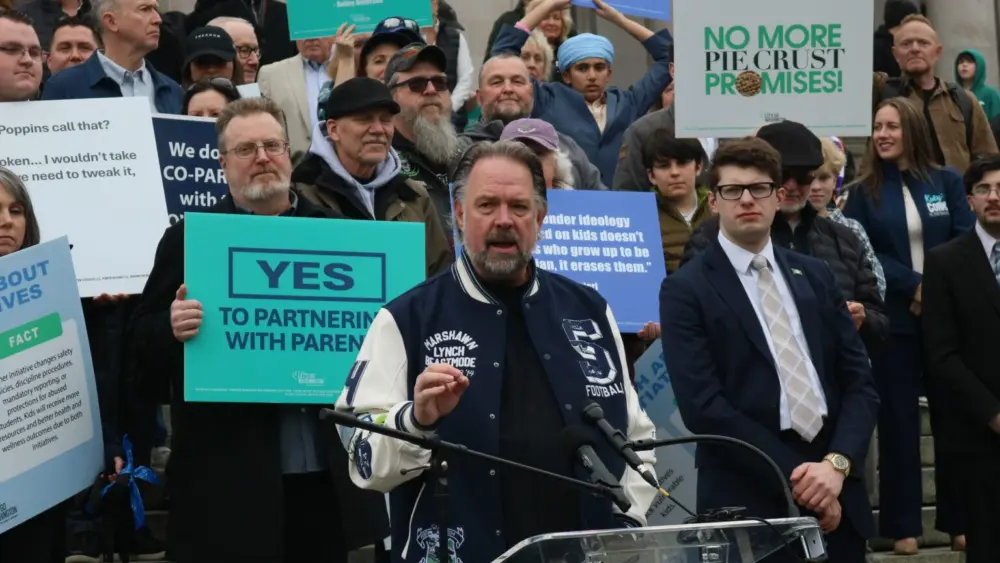 Let’s Go Washington founder Brian Heywood speaks to supporters of his group’s initiatives to bolster parental rights and block transgender athletes from girls’ sports, at the Washington state Capitol, Tuesday, Feb. 3, 2026. (Photo by Aspen Ford/Washington State Standard)
