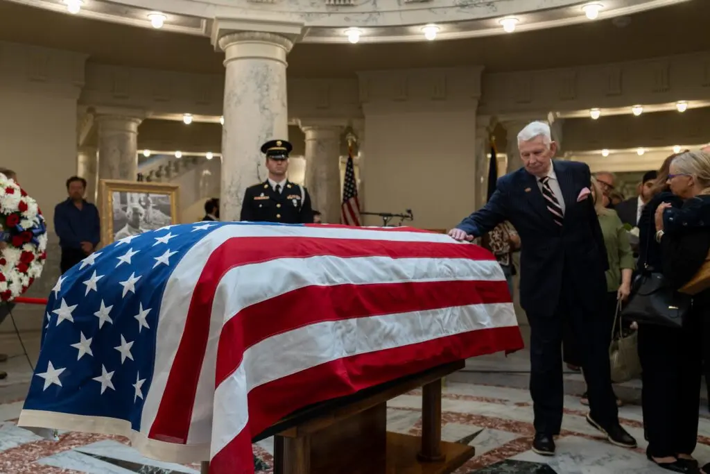 Former Idaho Attorney General David Leroy pays his respects as former Idaho Gov. Dirk Kempthorne lies in state in the Idaho State Capitol on Friday, May 15, 2026. (Photo by Kyle Pfannenstiel/Idaho Capital Sun)