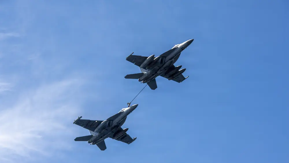 Two U.S. Navy EA-18G Growlers conduct an aerial refueling demonstration over the Pacific Ocean in April 2026. Two EA-18G aircraft assigned to Electronic Attack Squadron 129 collided during an air show performance near Mountain Home Air Force Base in Idaho on May 17. (U.S. Navy photo by Mass Communication Specialist Seaman Julian Jaime)