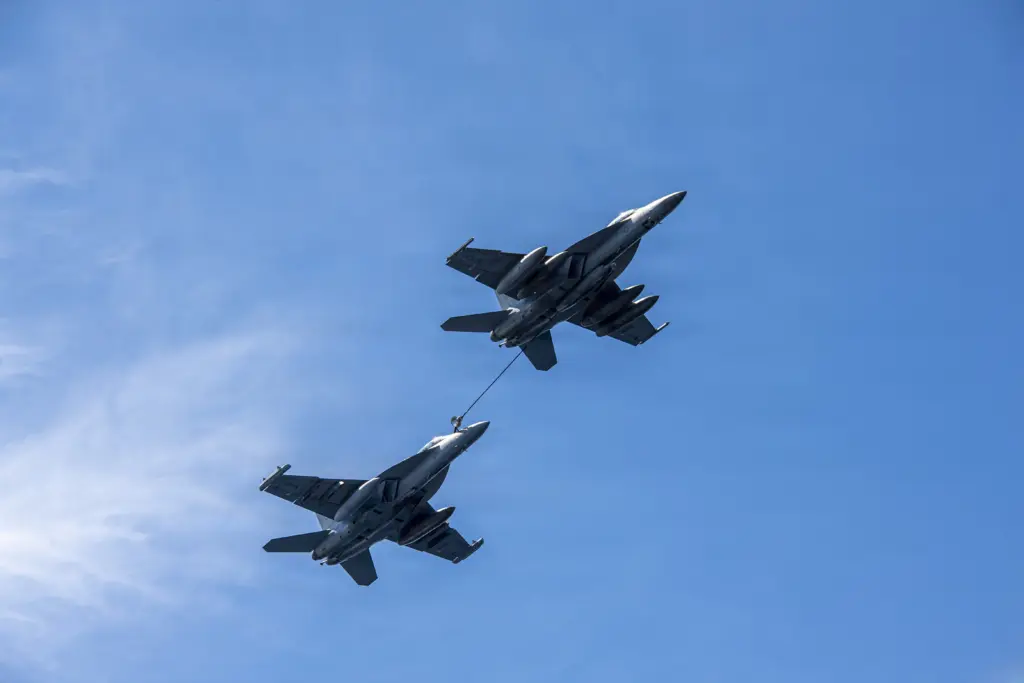 Two U.S. Navy EA-18G Growlers conduct an aerial refueling demonstration over the Pacific Ocean in April 2026. Two EA-18G aircraft assigned to Electronic Attack Squadron 129 collided during an air show performance near Mountain Home Air Force Base in Idaho on May 17. (U.S. Navy photo by Mass Communication Specialist Seaman Julian Jaime)