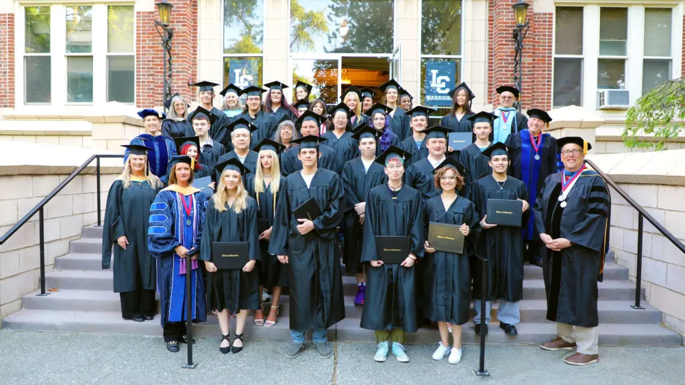 GED graduates pose for a group photo on the Lewis-Clark State College campus Tuesday, May 19.