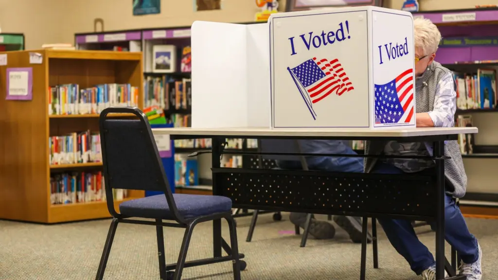 A voter casts her ballot during the May 19, 2026, primary election at Westside Elementary School in Idaho Falls. (Photo by Pat Sutphin for the Idaho Capital Sun)