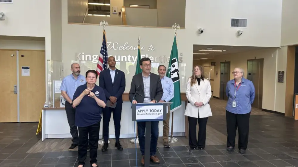 Washington Gov. Bob Ferguson speaks at a press conference at a disaster assistance center to push residents to apply for federal assistance to recover from flooding in December 2025 on Wednesday, May 20, 2026, in Renton. (Photo by Jake Goldstein-Street/Washington State Standard)
