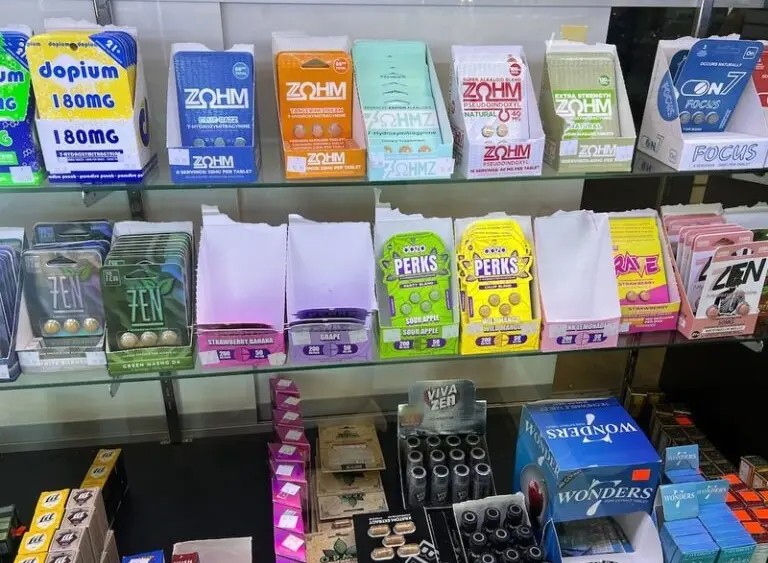 A variety of kratom and 7-OH products — including capsules, cartridges and wellness shots — are on display at a smoke shop in Buffalo, N.Y. Some states have led the way in regulating kratom, and now federal officials want to ban 7-OH, a powerful compound found in some kratom products. (Photo by Amanda Hernández/Stateline)