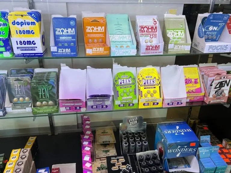 A variety of kratom and 7-OH products — including capsules, cartridges and wellness shots — are on display at a smoke shop in Buffalo, N.Y. Some states have led the way in regulating kratom, and now federal officials want to ban 7-OH, a powerful compound found in some kratom products. (Photo by Amanda Hernández/Stateline)