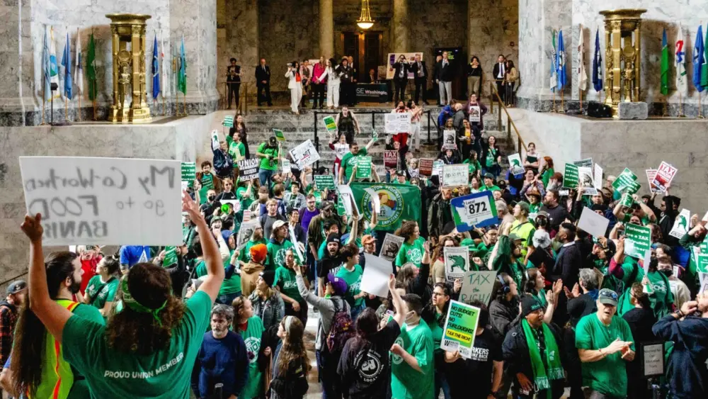 Hundreds of state workers entered the state Capitol in Olympia to protest potential furloughs amid a massive budget shortfall on Wednesday, April 9, 2025. (Photo by Jacquelyn Jimenez Romero/Washington State Standard)