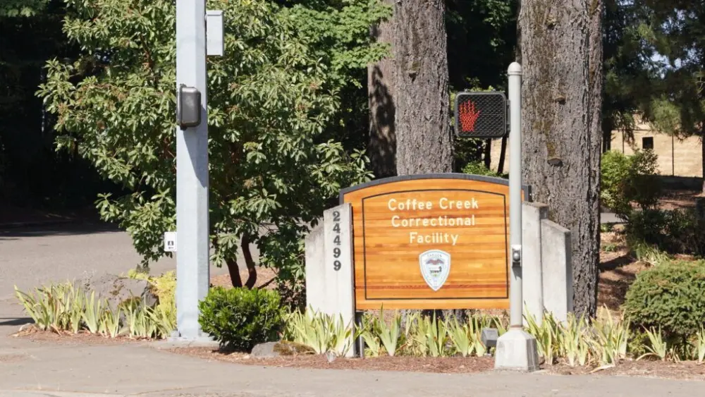 The entrance of Coffee Creek Correctional Facility in Wilsonville, Oregon’s only women’s prison. A new federal appeals court ruling weighs in on a case related to the placement of transgender women in Oregon prisons, including in Coffee Creek. (Photo by Ben Botkin/Oregon Capital Chronicle)