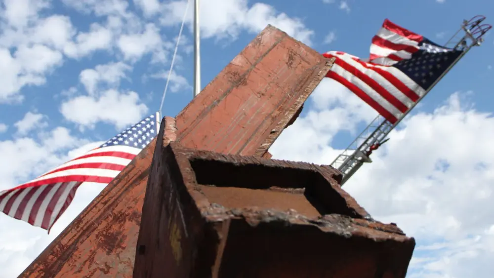 Steel beams from the wreckage of the World Trade Centers are on display at the unveiling of the Whitefish 9/11 Memorial on Sept. 11, 2026. (Micah Drew/Daily Montanan)