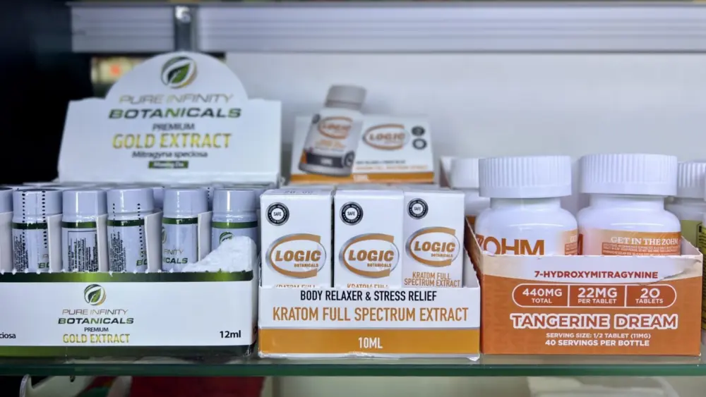 Liquid kratom extracts and capsules containing 7-OH are displayed for sale at a smoke shop in Buffalo, N.Y. A growing market is prompting state lawmakers to reconsider how the substance should be regulated. (Photo by Amanda Watford/Stateline)