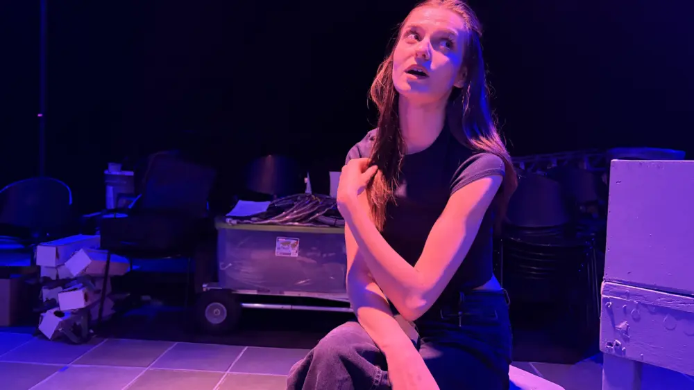 Cambree Miller rehearses the role of Julia in University of Idaho Theatre Arts’ production of “1984.”
