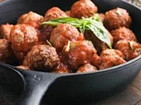 close-up-of-meatballs-with-basil