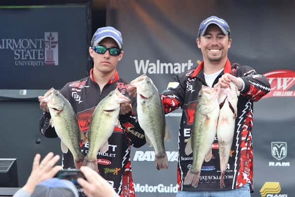 The University of Arkansas-Fayetteville team of Zachery Pickle (left) and Drew Porto show off Saturday's catch of 21-15 that gave them the FLW College Fishing Kentucky Lake Open win with a two-day total of 43-12.