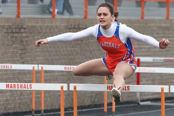 Brandy Baas, pictured here at a Marshall County meet, took 3rd in the 300 meter hurdles at Murray's All-Comers meet Tuesday.