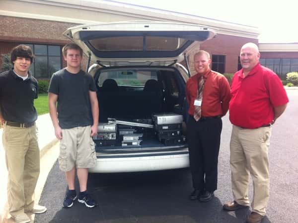 L to R: Students, Tyler Boddy and Coby Melton; Patrick Waters, IT Department Director at MCH; and Russ Buchanan, Marshall County Schools CIO