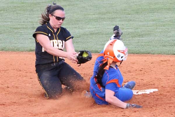 Bailey Murphy slid safely into second base in the first half of their rain-postponed game on April 21st that was completed on Monday.