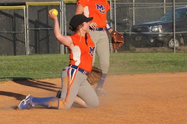 Peyton Smothers with the stop and throw from her knees to get the runner out at first.