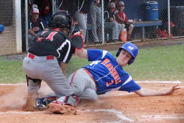 Hunter Jaco was tagged out at home plate in the Marshals Region 1 Tournament game against Hickman County.